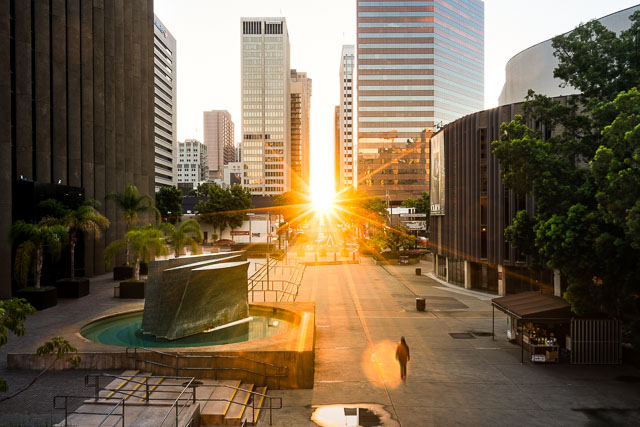 The sunrise aligned with the streets in Downtown San Diego by the Civic Center Plaza. This Henge effect occurs twice a year.